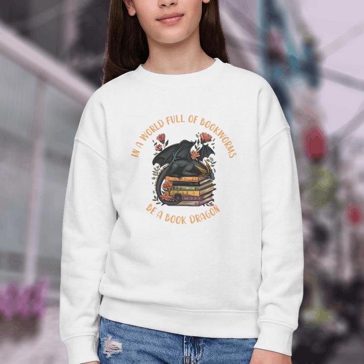 In A World Full Of Bookworms Be A Book Dragon Book Lover Youth Crewneck Sweatshirt In A World Full Of Bookworms Be A Book Dragon Book Lover Youth Crewneck Sweatshirt