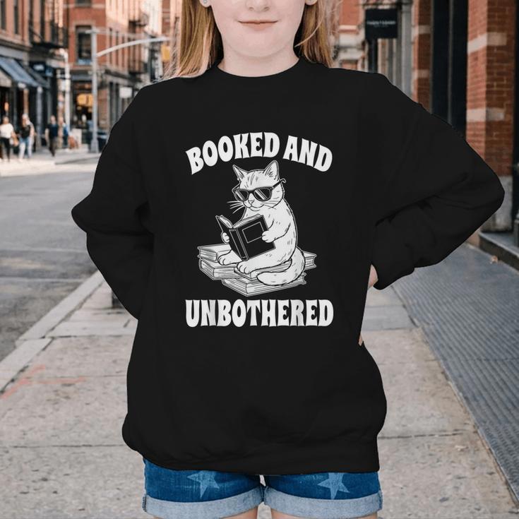 Booked And Unbothered Cat Reading Book Lovers Youth Crewneck Sweatshirt