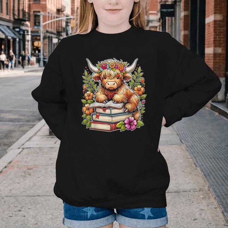 Bookworm Cute Highland Cow Reading Book Youth Crewneck Sweatshirt Bookworm Cute Highland Cow Reading Book Youth Crewneck Sweatshirt