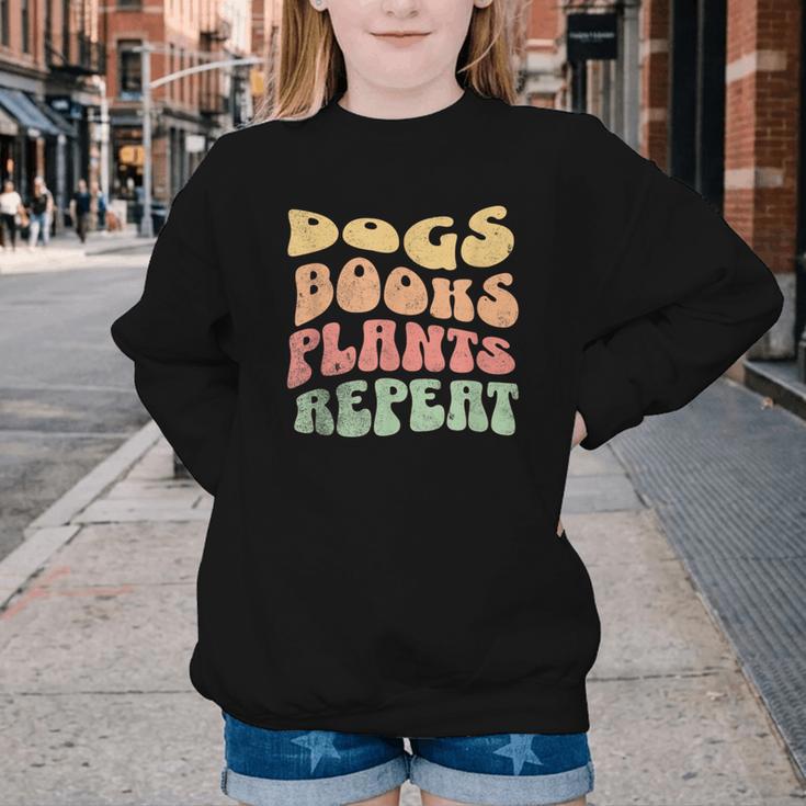 Colorful Dogs Books Plants Repeat Youth Crewneck Sweatshirt Colorful Dogs Books Plants Repeat Youth Crewneck Sweatshirt