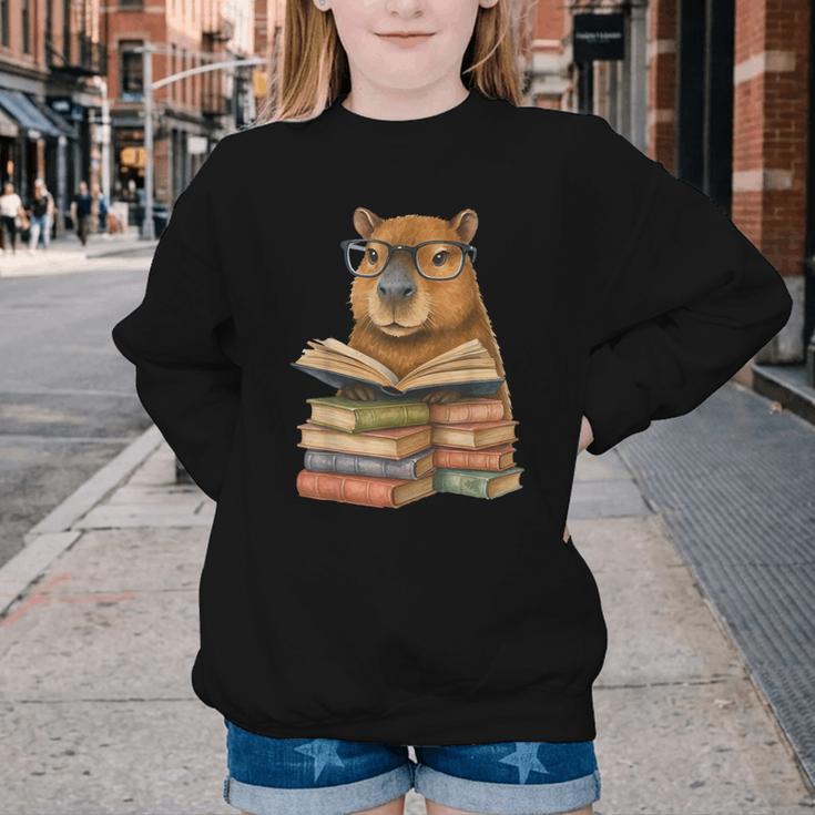 Cute Capybara Reading Books Animal Capybara Bookworms Youth Crewneck Sweatshirt