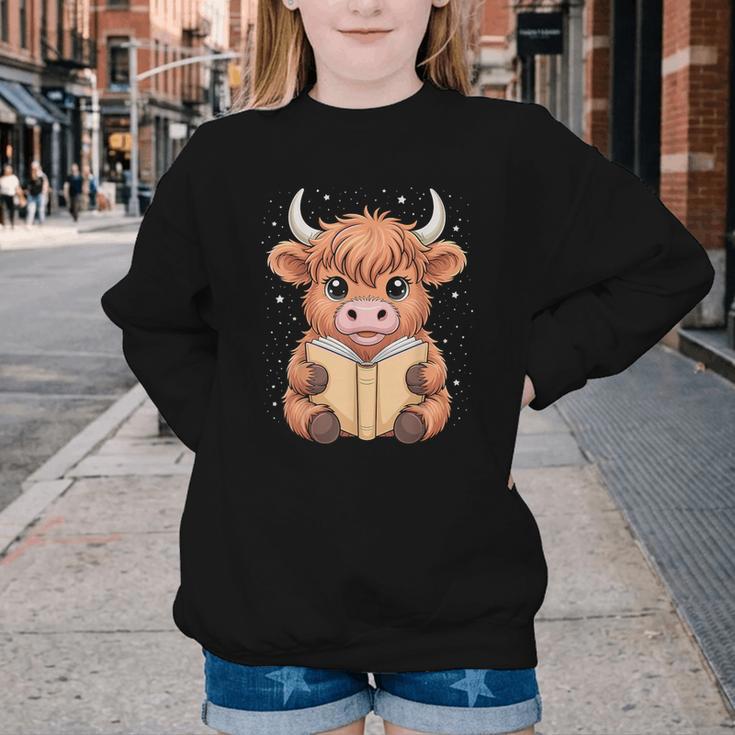 Cute Highland Cow Reading Book Youth Crewneck Sweatshirt