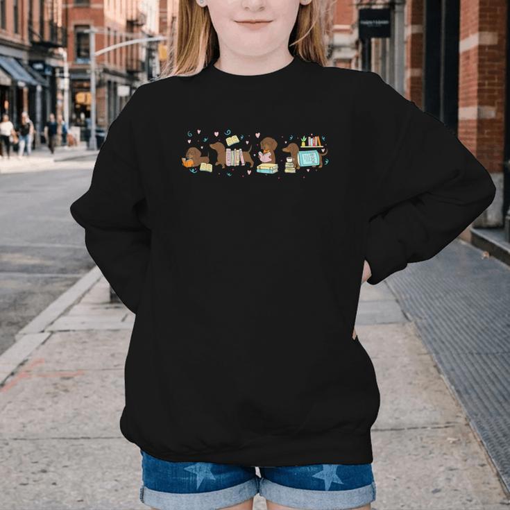 Dachshund Book Lover Reading Wiener Dog 100 Days Of School Youth Crewneck Sweatshirt Dachshund Book Lover Reading Wiener Dog 100 Days Of School Youth Crewneck Sweatshirt