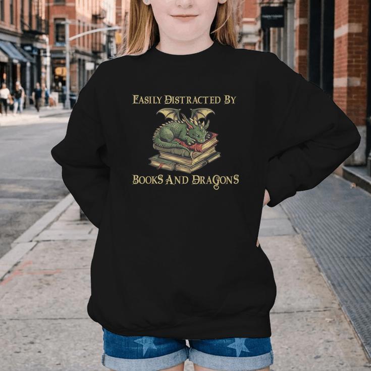 Easily Distracted By Books And Dragons Graphic Youth Crewneck Sweatshirt