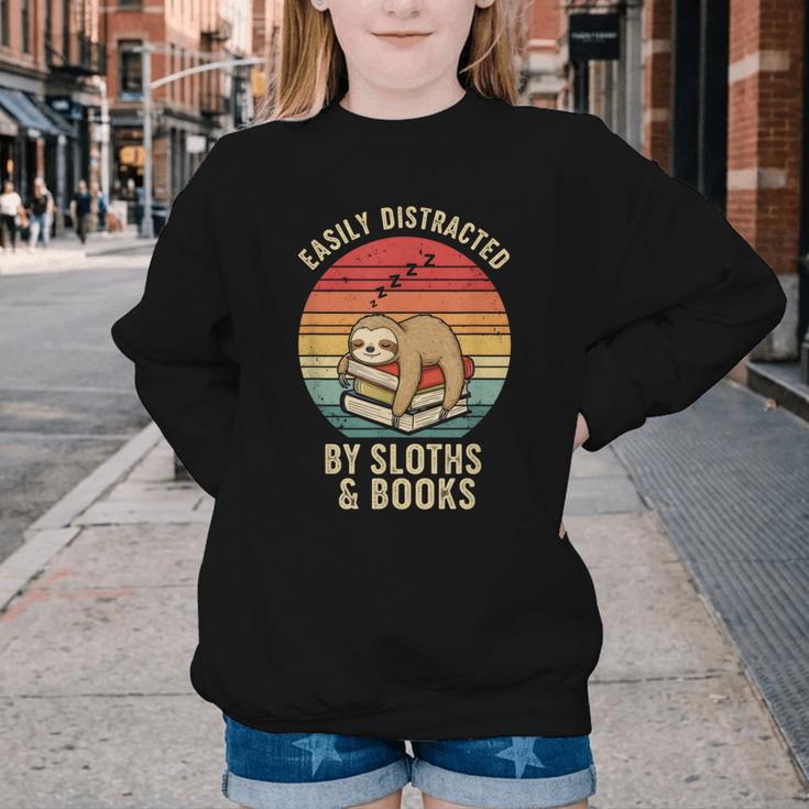 Easily Distracted By Sloths And Books Youth Crewneck Sweatshirt