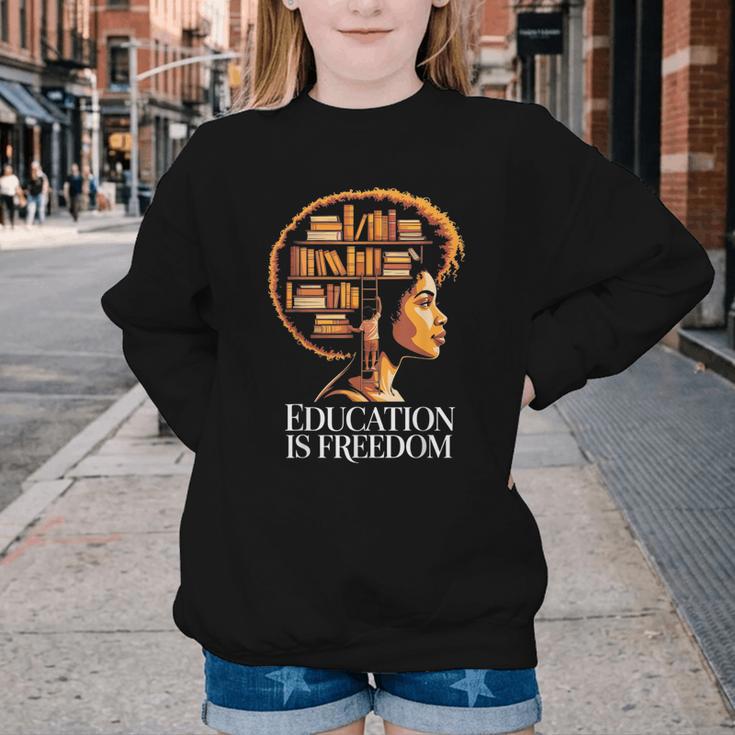 Education Is Freedom Afro Woman Book Illustration Youth Crewneck Sweatshirt Education Is Freedom Afro Woman Book Illustration Youth Crewneck Sweatshirt
