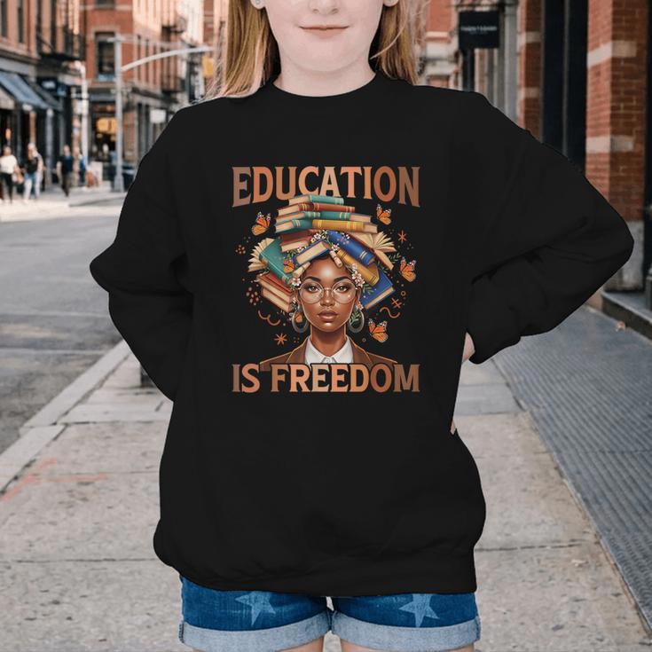 Education Is Freedom Teacher Books Black History Month Youth Crewneck Sweatshirt