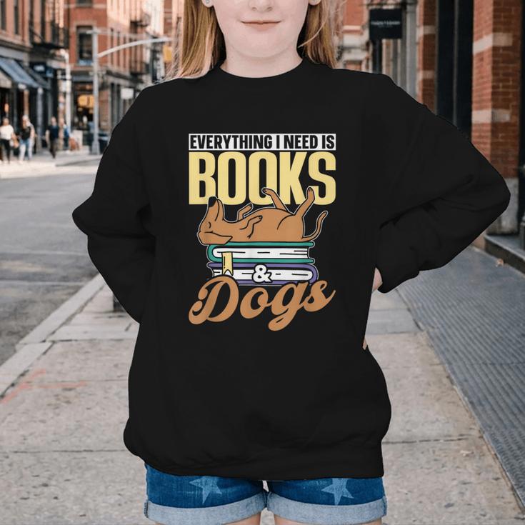 Everything I Need Is Books & Dogs Reader Book Read Reading Youth Crewneck Sweatshirt