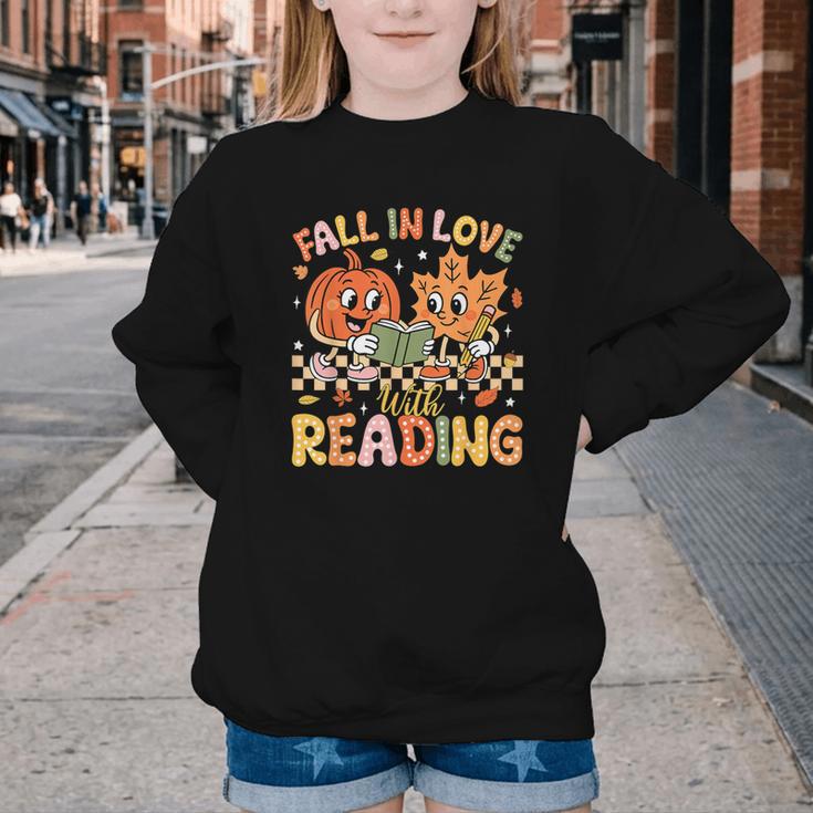 Fall In Love With Reading Autumn Pumpkin Teacher Book Lover Youth Crewneck Sweatshirt