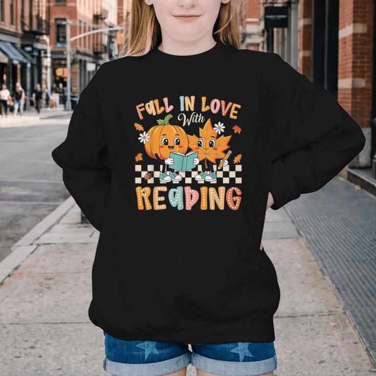 Fall In Love With Reading Thanksgiving Pumpkin Book Lover Youth Crewneck Sweatshirt