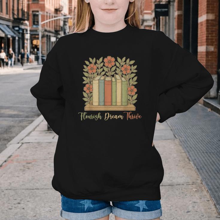 Flourish Dream Thrive Resist 84 67 Book Reading Nature Lover Youth Crewneck Sweatshirt