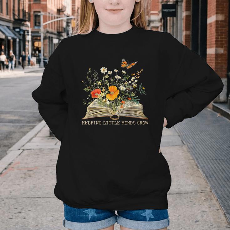 Helping Little Minds Grow Floral Book Education SPED Teacher Youth Crewneck Sweatshirt Helping Little Minds Grow Floral Book Education SPED Teacher Youth Crewneck Sweatshirt