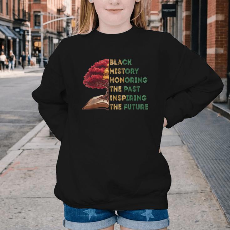 Honoring Past Inspiring Future History Month Tree Book Youth Crewneck Sweatshirt