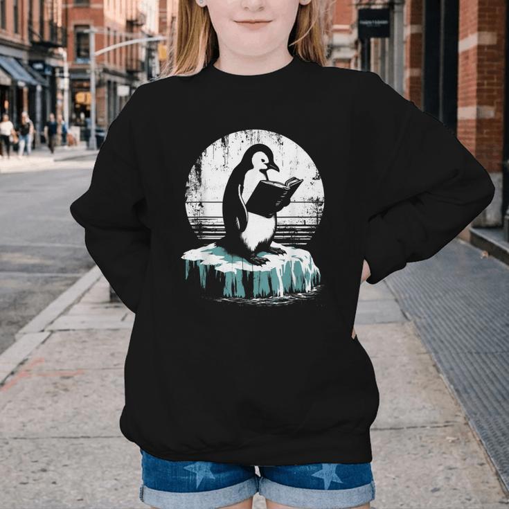 Penguin Reading A Book Vintage Graphic Bookworm Lover Youth Crewneck Sweatshirt Penguin Reading A Book Vintage Graphic Bookworm Lover Youth Crewneck Sweatshirt