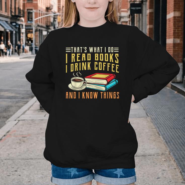 That What i Do i Read Books And i Know Things Coffee Reading Youth Crewneck Sweatshirt That What i Do i Read Books And i Know Things Coffee Reading Youth Crewneck Sweatshirt