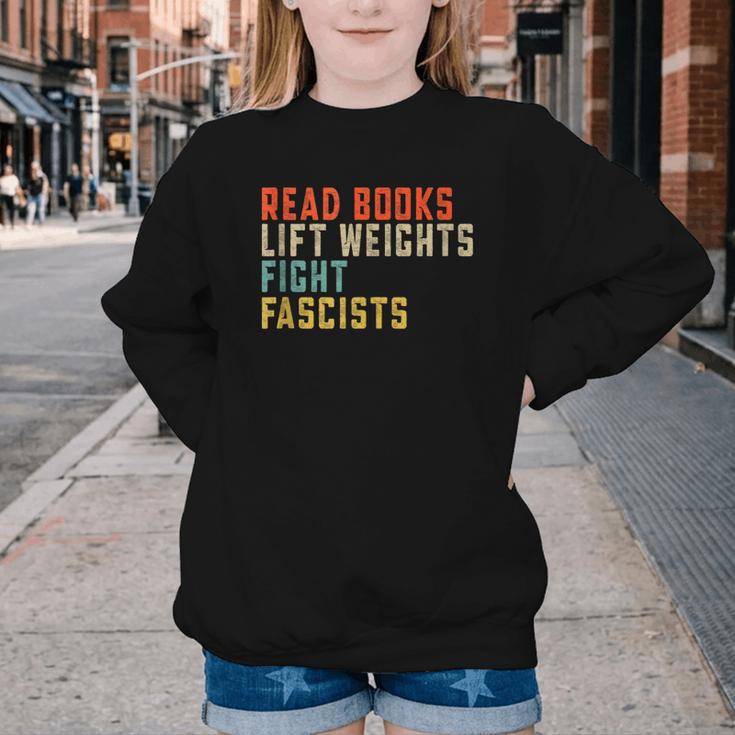 Read Books Lift Weights Fight Fascists Reading Youth Crewneck Sweatshirt