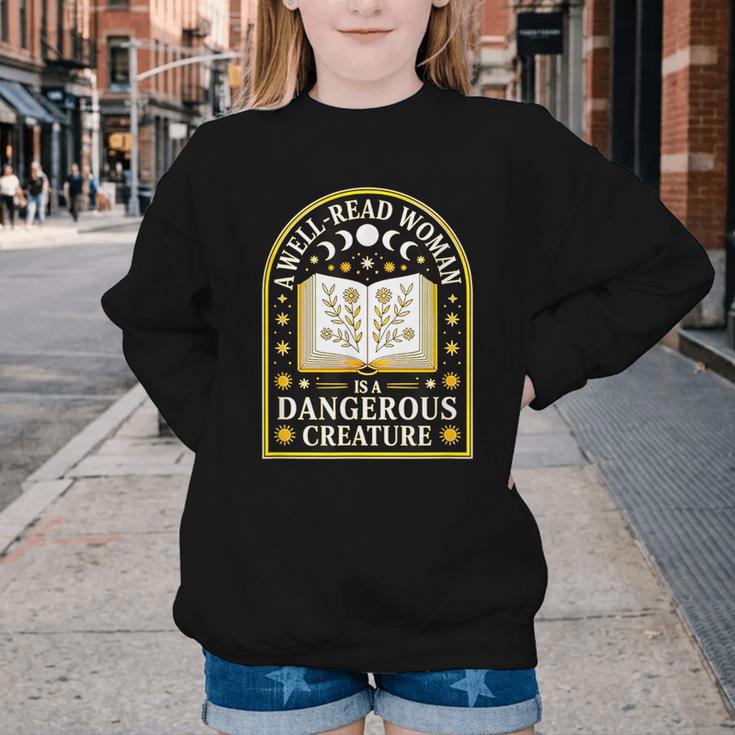 A Well Read Woman Is A Dangerous Creature For Book Lovers Youth Crewneck Sweatshirt A Well Read Woman Is A Dangerous Creature For Book Lovers Youth Crewneck Sweatshirt