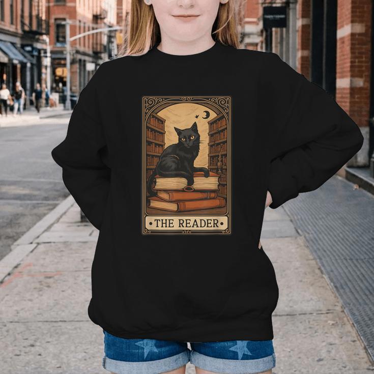 The Reader Cat Book Reading Halloween Tarot Card Youth Crewneck Sweatshirt The Reader Cat Book Reading Halloween Tarot Card Youth Crewneck Sweatshirt