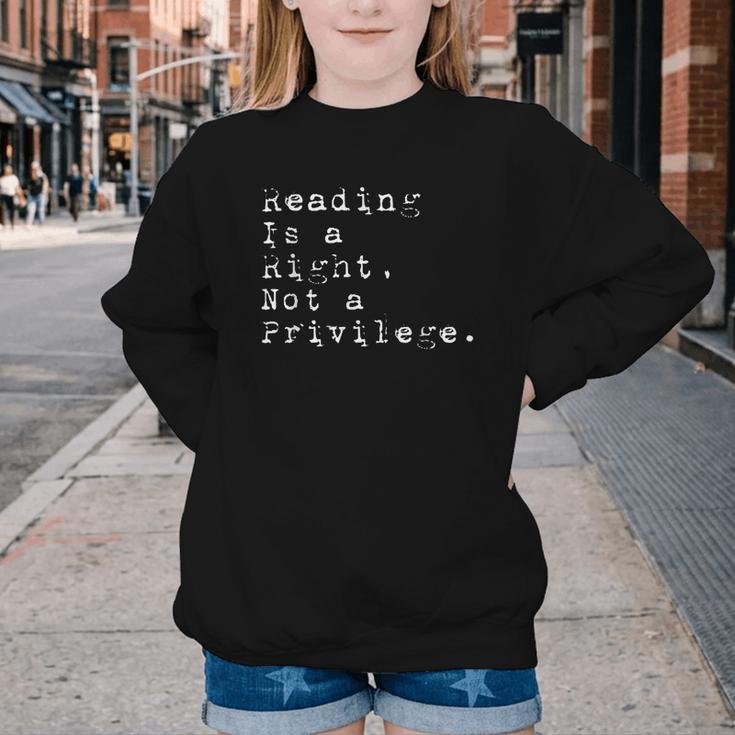 Reading Is a Right Not a Privilege Banned Books Youth Crewneck Sweatshirt Reading Is a Right Not a Privilege Banned Books Youth Crewneck Sweatshirt