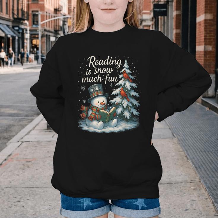 Reading Is Snow Much Fun Christmas Books Snowman Bookworm Youth Crewneck Sweatshirt Reading Is Snow Much Fun Christmas Books Snowman Bookworm Youth Crewneck Sweatshirt