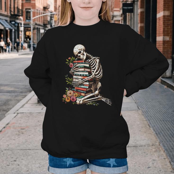 Skeleton Reading Book Halloween Bookworm Bibliophile Reader Youth Crewneck Sweatshirt