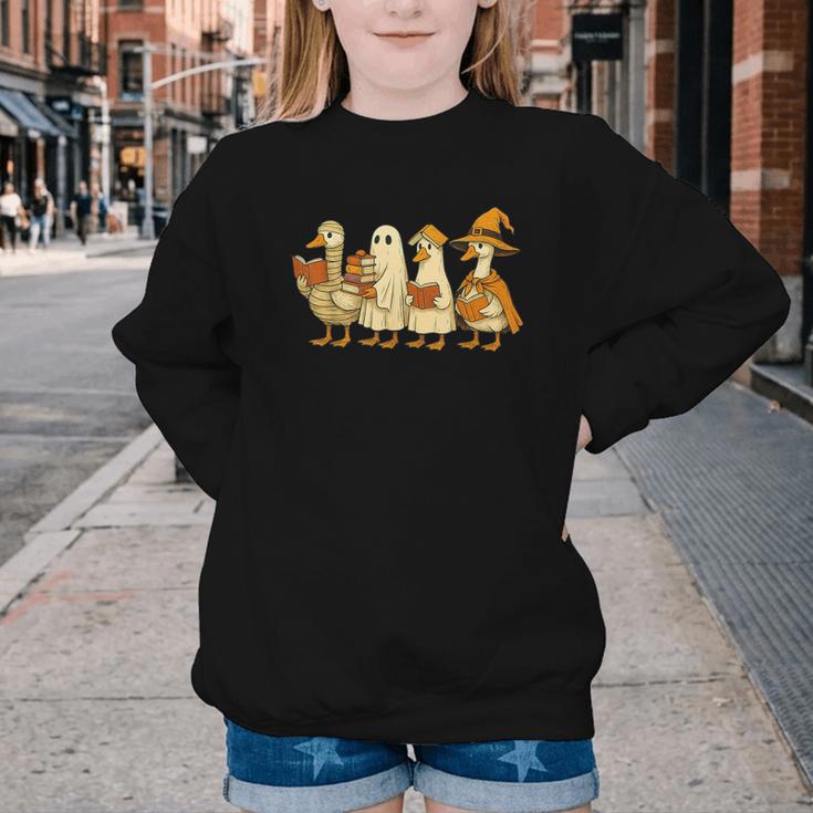 Spooky Halloween Book Lover Halloween Reading Goose Youth Crewneck Sweatshirt Spooky Halloween Book Lover Halloween Reading Goose Youth Crewneck Sweatshirt