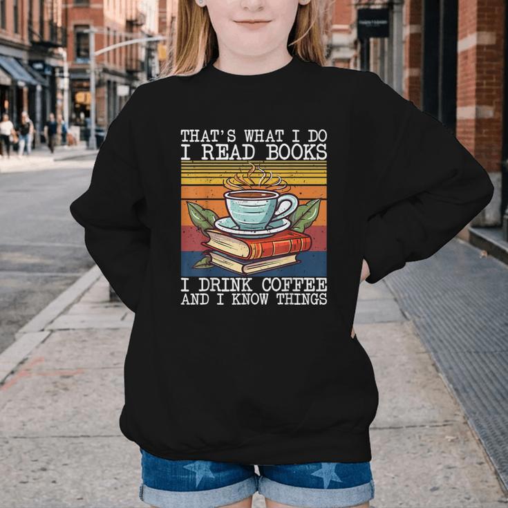 That's What I Do I Read Books Drink Coffee And I Know Things Youth Crewneck Sweatshirt That's What I Do I Read Books Drink Coffee And I Know Things Youth Crewneck Sweatshirt