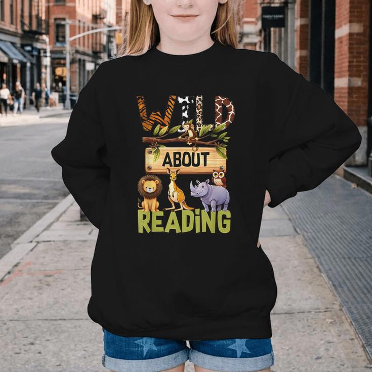 Wild About Reading Reading Books And Bookworm Library Day Youth Crewneck Sweatshirt