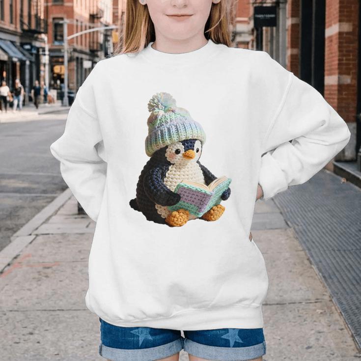 Cute Penguin Reading Book Faux-Crochet Print Youth Crewneck Sweatshirt Cute Penguin Reading Book Faux-Crochet Print Youth Crewneck Sweatshirt