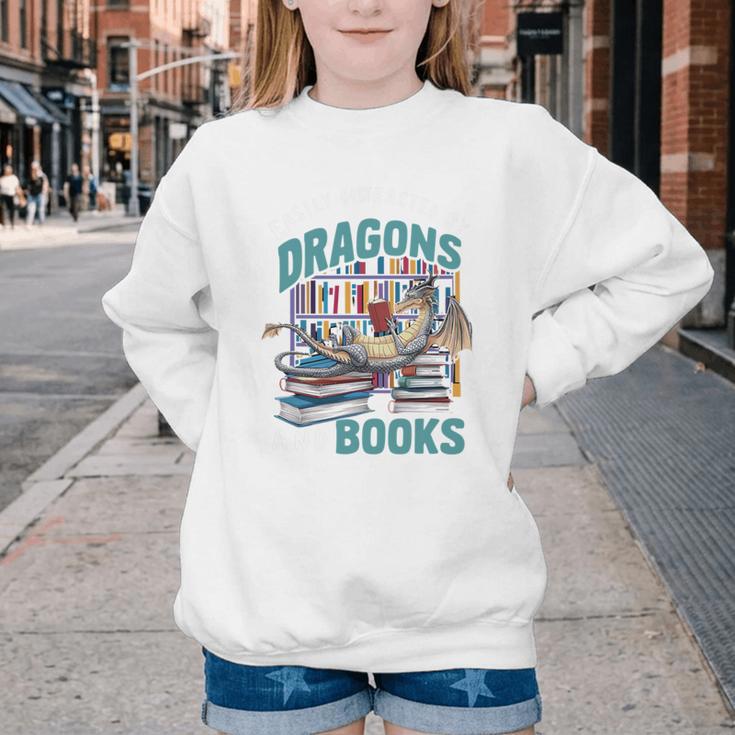 Easily Distracted By Dragons And Books Bookworm Youth Crewneck Sweatshirt Easily Distracted By Dragons And Books Bookworm Youth Crewneck Sweatshirt