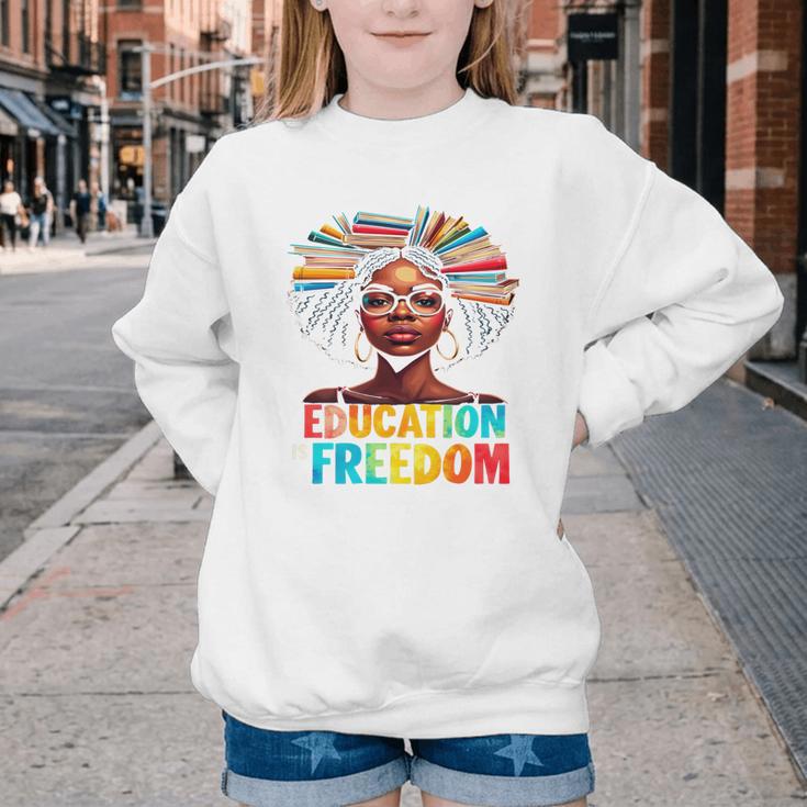 Education Is Freedom Afro Books Youth Crewneck Sweatshirt Education Is Freedom Afro Books Youth Crewneck Sweatshirt