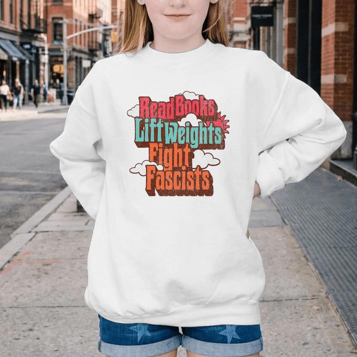 Read Books Lift Weights Fight Fascists Reading No Kings Premium Tri-Blend Youth Crewneck Sweatshirt
