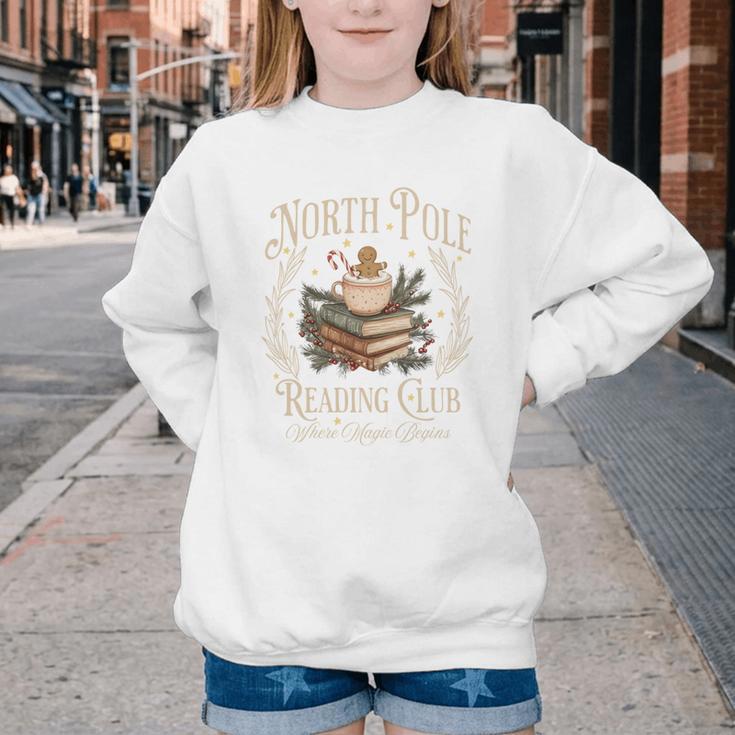Retro North Pole Reading Club Hot Cocoa Book Lovers Xmas Youth Crewneck Sweatshirt Retro North Pole Reading Club Hot Cocoa Book Lovers Xmas Youth Crewneck Sweatshirt