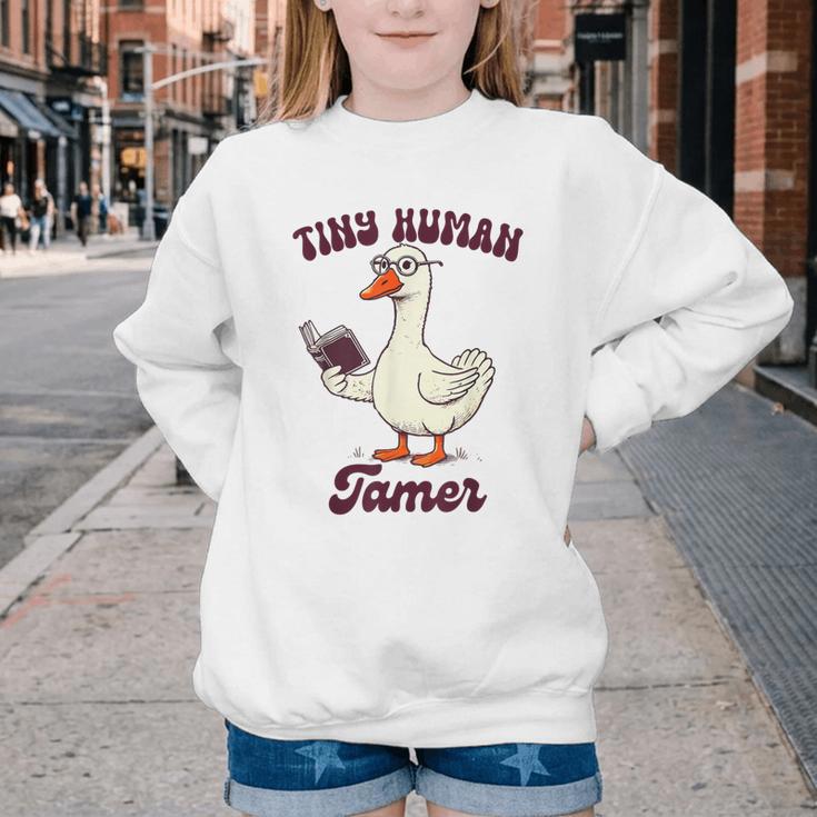 Teacher Silly Goose Reading Book Teaching Tiny Human Tamer Youth Crewneck Sweatshirt