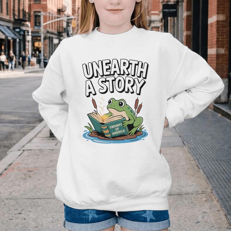 Unearth a Story Frog Reading a Book Summer 2026 Premium Tri-Blend Youth Crewneck Sweatshirt