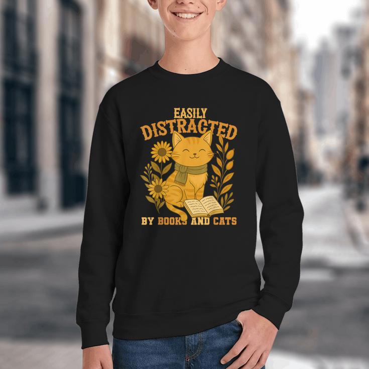 Easily Distracted By Cats And Books Cute Cat Book Lover Youth Crewneck Sweatshirt