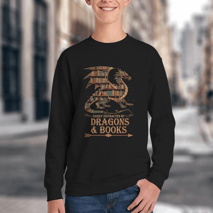 Easily Distracted By Dragons And Books Library Dragon Lover Youth Crewneck Sweatshirt Easily Distracted By Dragons And Books Library Dragon Lover Youth Crewneck Sweatshirt