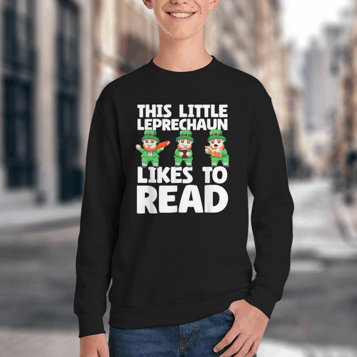 This Little Leprechaun Likes To Read St Patrick's Day Book Youth Crewneck Sweatshirt This Little Leprechaun Likes To Read St Patrick's Day Book Youth Crewneck Sweatshirt