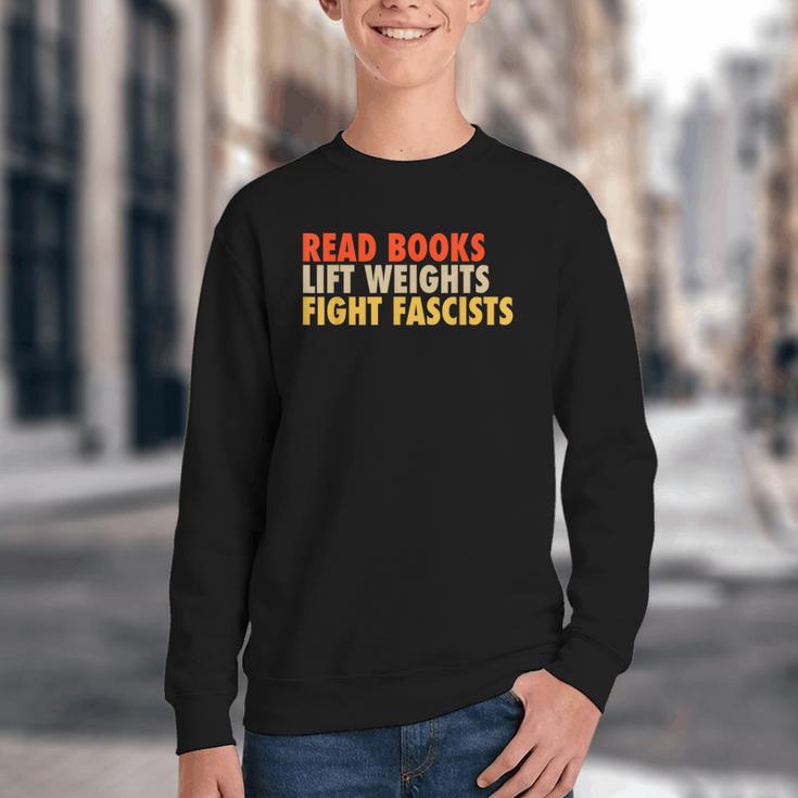 Read Books Lift Weights Fight Fascists Reading Humor Youth Crewneck Sweatshirt Read Books Lift Weights Fight Fascists Reading Humor Youth Crewneck Sweatshirt