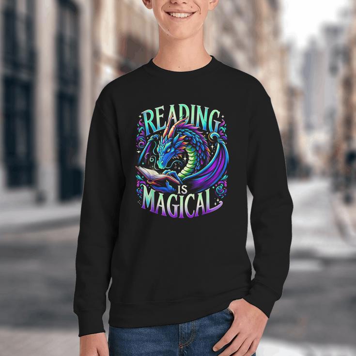 Reading Is Magical Dragon Tee Perfect For Book Lovers Kids Youth Crewneck Sweatshirt Reading Is Magical Dragon Tee Perfect For Book Lovers Kids Youth Crewneck Sweatshirt