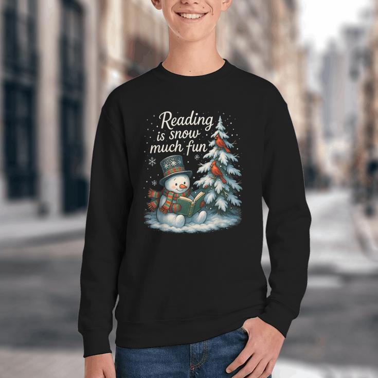 Reading Is Snow Much Fun Christmas Books Snowman Bookworm Youth Crewneck Sweatshirt Reading Is Snow Much Fun Christmas Books Snowman Bookworm Youth Crewneck Sweatshirt