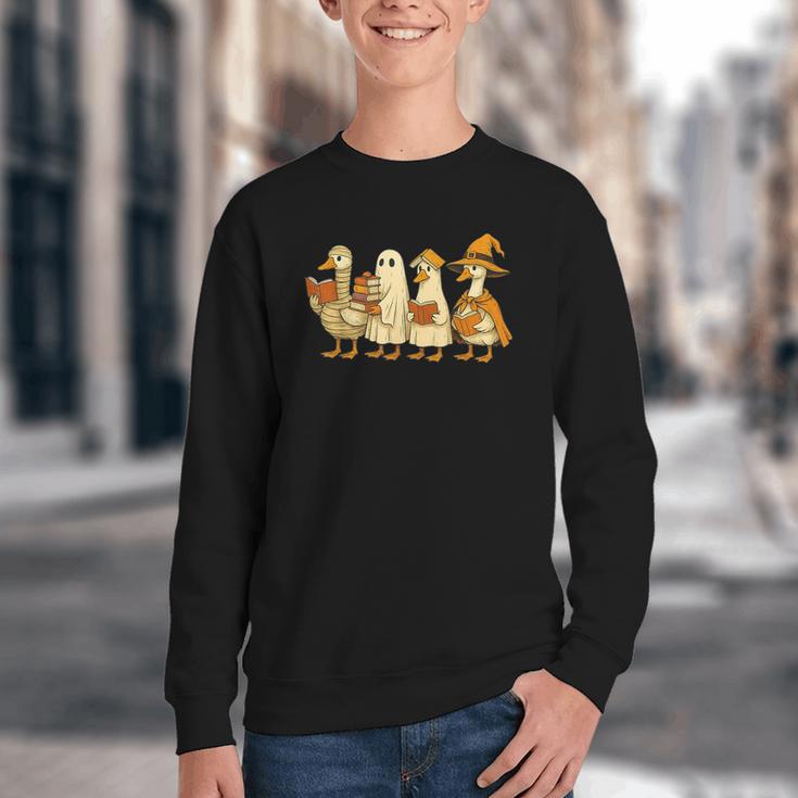 Spooky Halloween Book Lover Halloween Reading Goose Youth Crewneck Sweatshirt Spooky Halloween Book Lover Halloween Reading Goose Youth Crewneck Sweatshirt