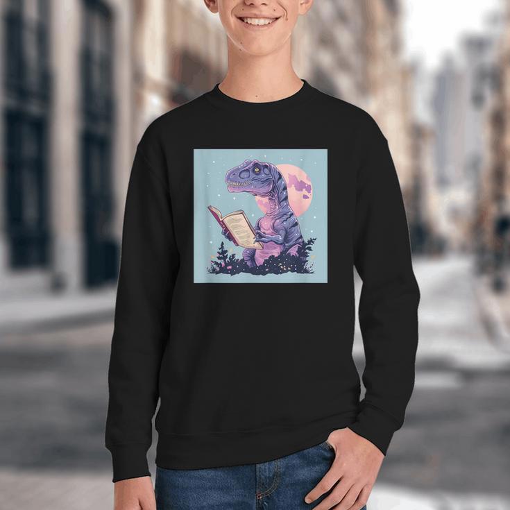 Trex Reading Book Dinosaur Youth Crewneck Sweatshirt Trex Reading Book Dinosaur Youth Crewneck Sweatshirt