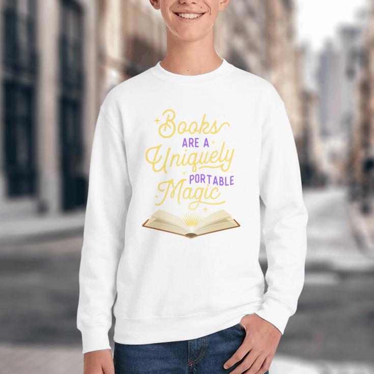 Books Are A Uniquely Portable Magic Reading Bookworm Youth Crewneck Sweatshirt Books Are A Uniquely Portable Magic Reading Bookworm Youth Crewneck Sweatshirt