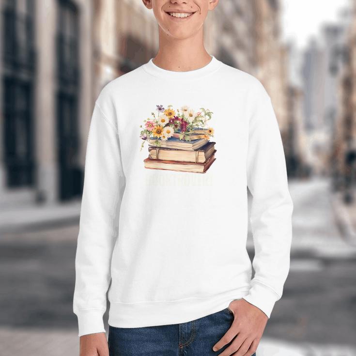 Booktrovert Vintage Wildflowers Books For Book Lovers Youth Crewneck Sweatshirt Booktrovert Vintage Wildflowers Books For Book Lovers Youth Crewneck Sweatshirt