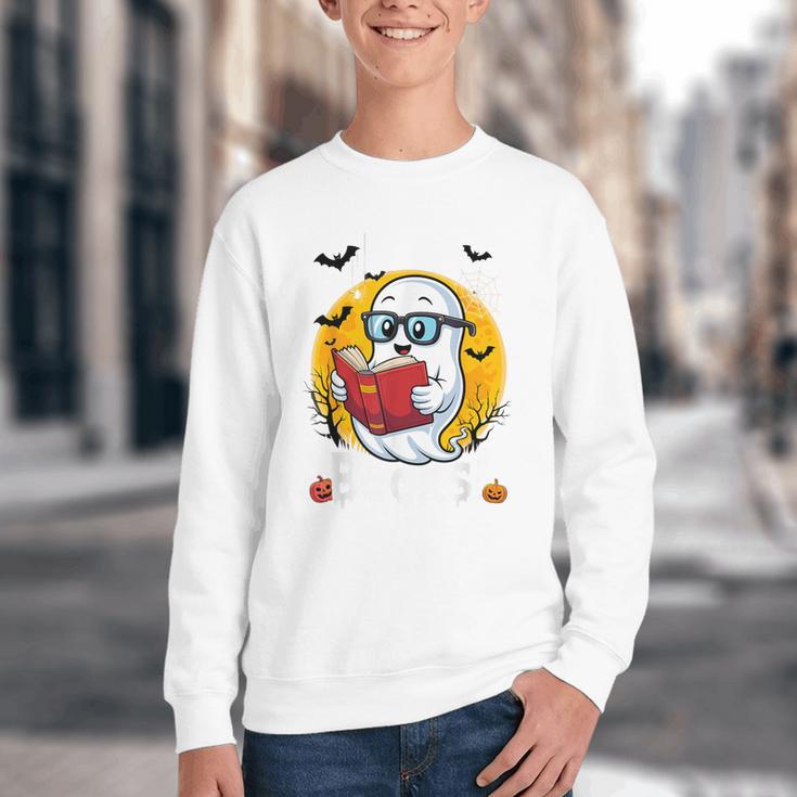 Cute Ghost Reading Book Retro Halloween Librarian Youth Crewneck Sweatshirt Cute Ghost Reading Book Retro Halloween Librarian Youth Crewneck Sweatshirt