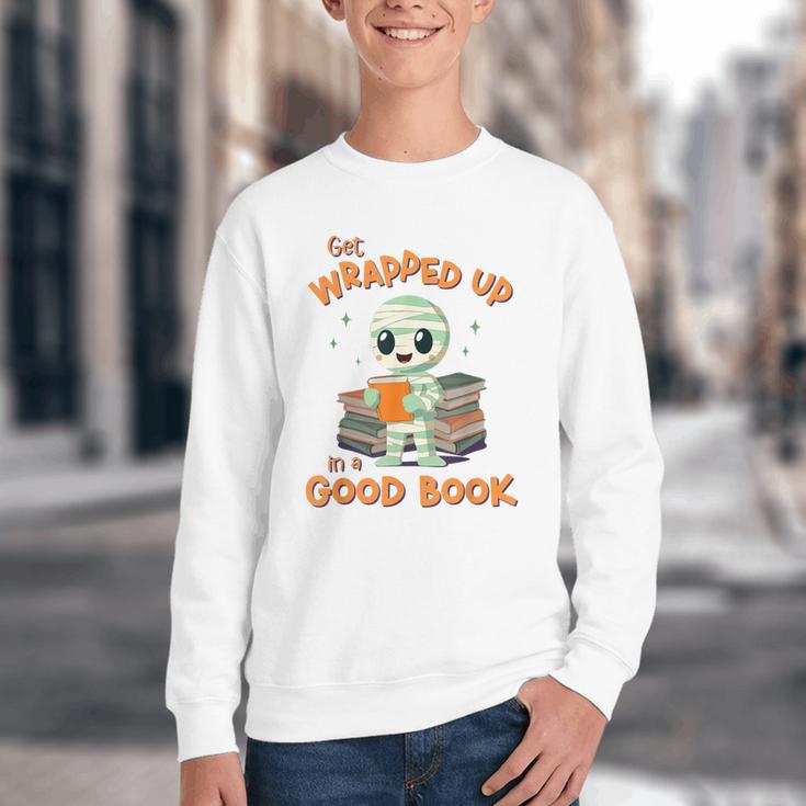 Cute Halloween Teacher Librarian Mummy Reading Books Youth Crewneck Sweatshirt