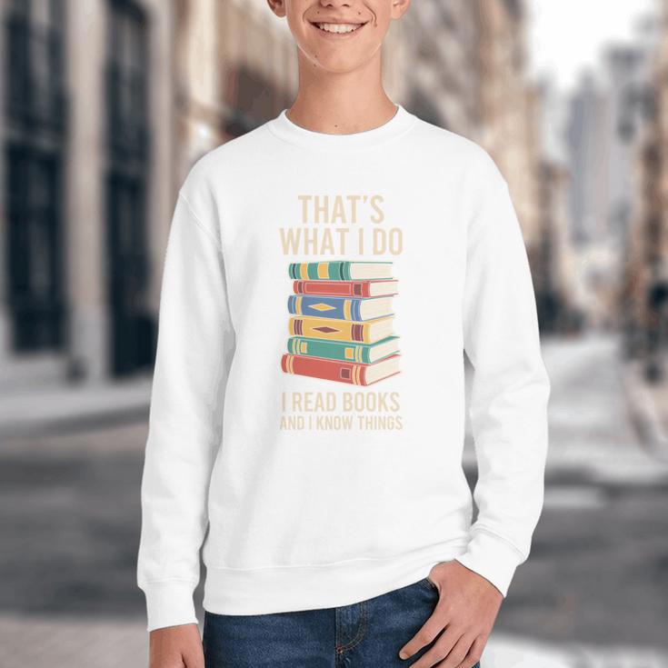 That's What i Do i Read Books And i Know Things Cute Graphic Youth Crewneck Sweatshirt
