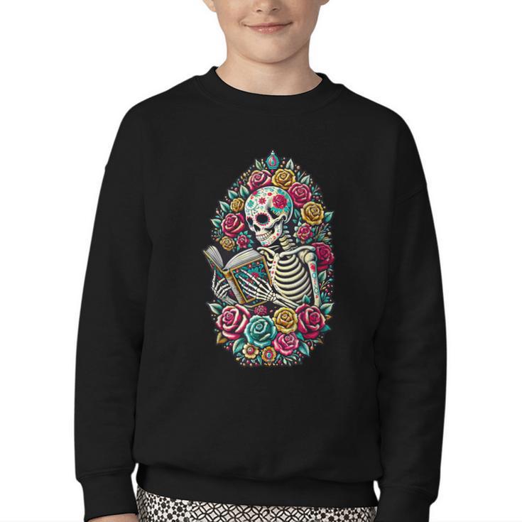 Book Lover Skeleton Reading With Dia De Los Muertos Flowers Youth Crewneck Sweatshirt