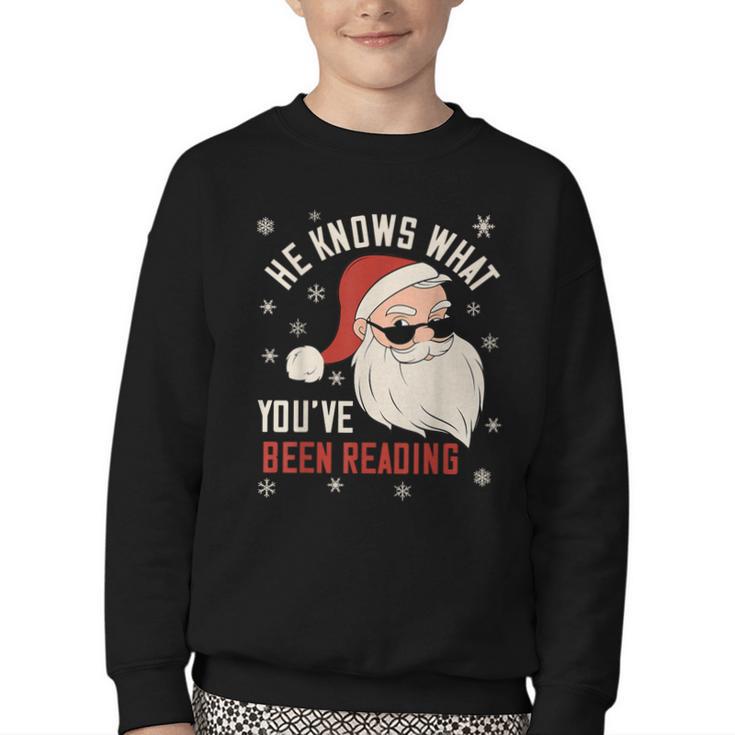 He Knows What You'Ve Been Reading Book Lover Women Santa Youth Crewneck Sweatshirt